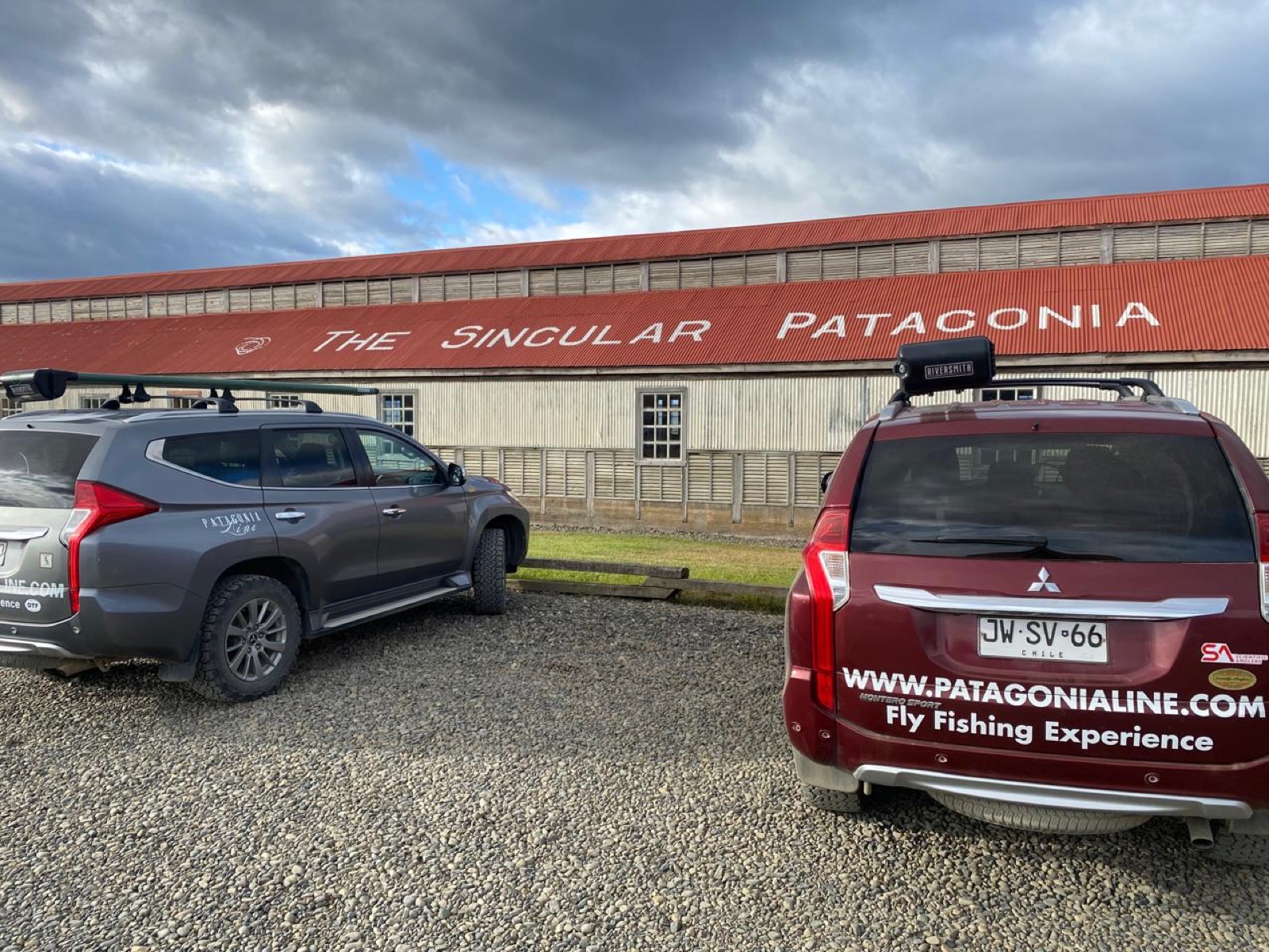 Two Patagonia Line vehicles parked outside The Singular, Puerto Bories